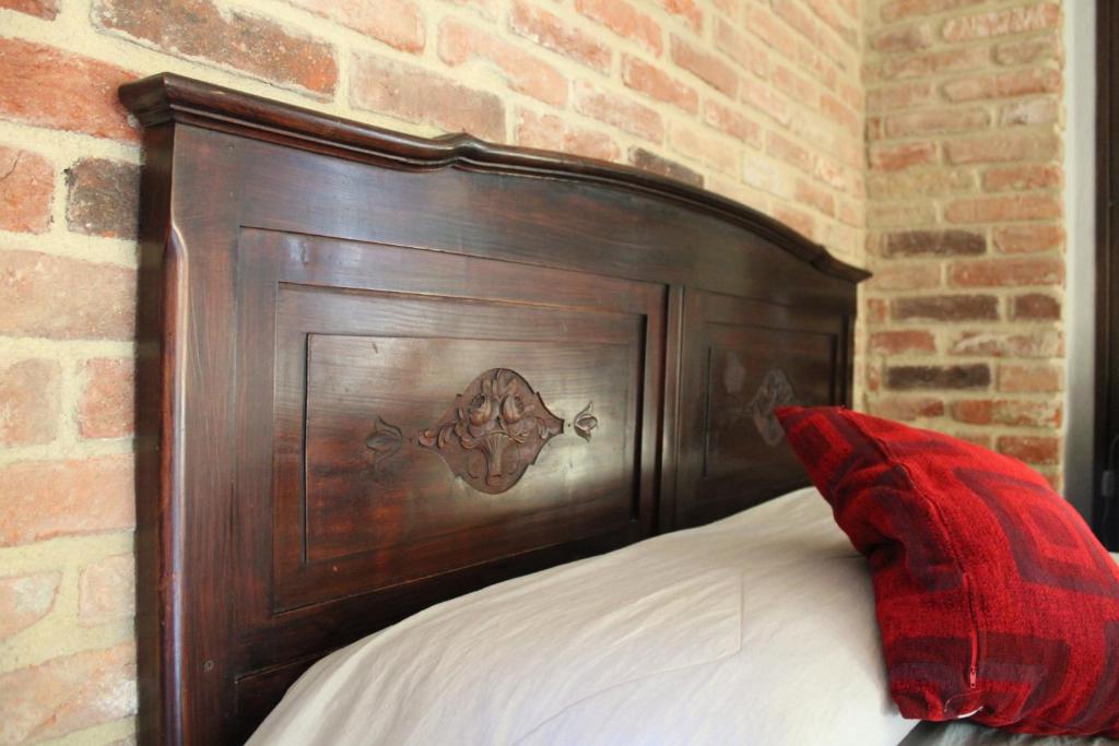 Postel nebo postele na pokoji v ubytování Red Wine Camere