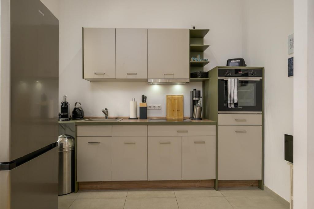 Kuchyň nebo kuchyňský kout v ubytování SweetHome - Luxus pur - große Küche, Terrasse, Stellplatz, WiFi