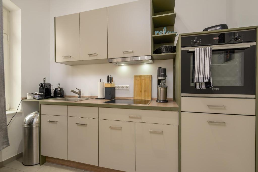 Kuchyň nebo kuchyňský kout v ubytování SweetHome - Luxus pur - große Küche, Terrasse, Stellplatz, WiFi