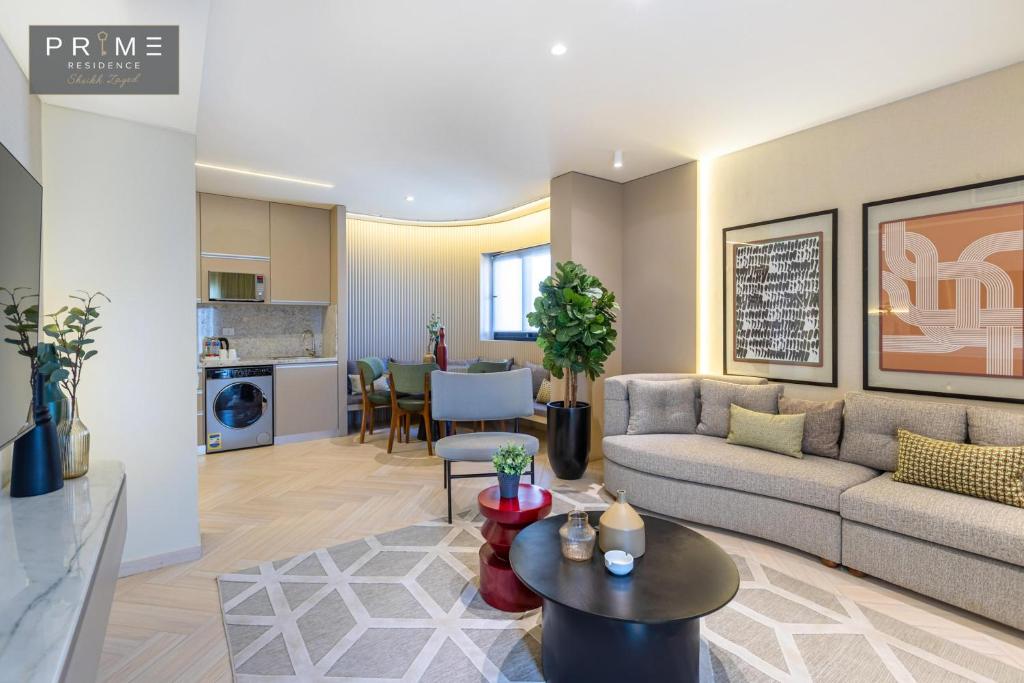 A kitchen or kitchenette at Prime Residence Sheikh Zayed