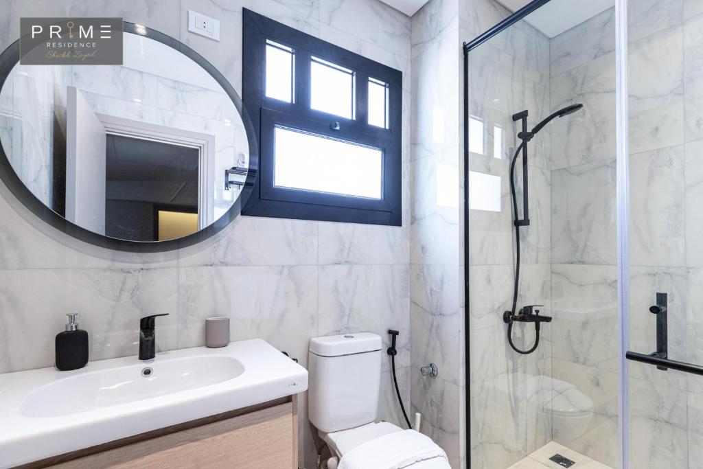 A bathroom at Prime Residence Sheikh Zayed