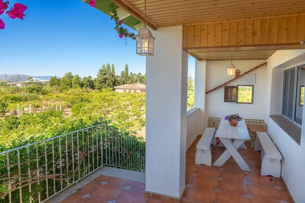 Balkón alebo terasa v ubytovaní Riuebre - Casa rural para 11 personas con piscina y vistas al Río Ebro - Deltavacaciones