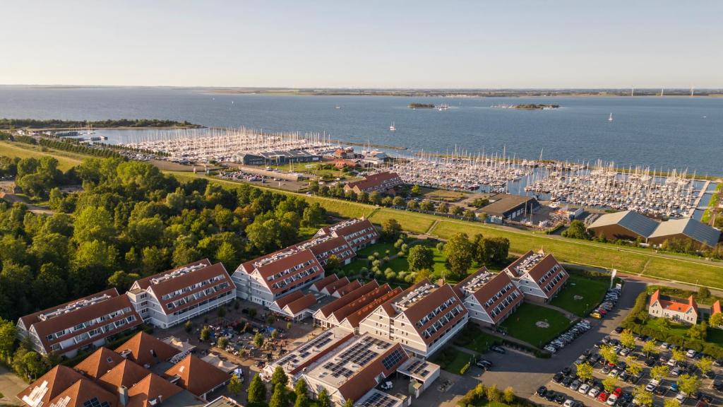 an aerial view of a city with a harbor at Summio Parc Aquadelta in Bruinisse