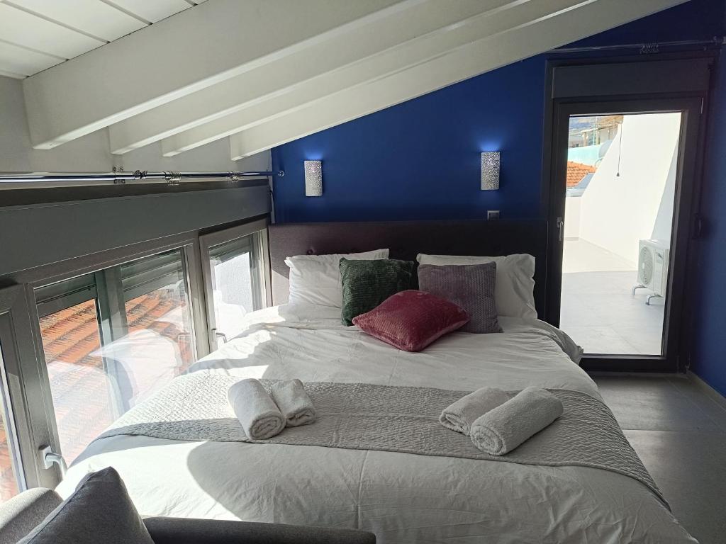 Ένα ή περισσότερα κρεβάτια σε δωμάτιο στο DATA Maisonettes and more