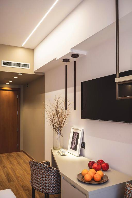 TV a/nebo společenská místnost v ubytování Albergo La Pace