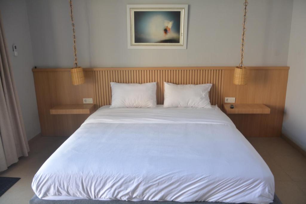 Postel nebo postele na pokoji v ubytování THe Kind Homestay