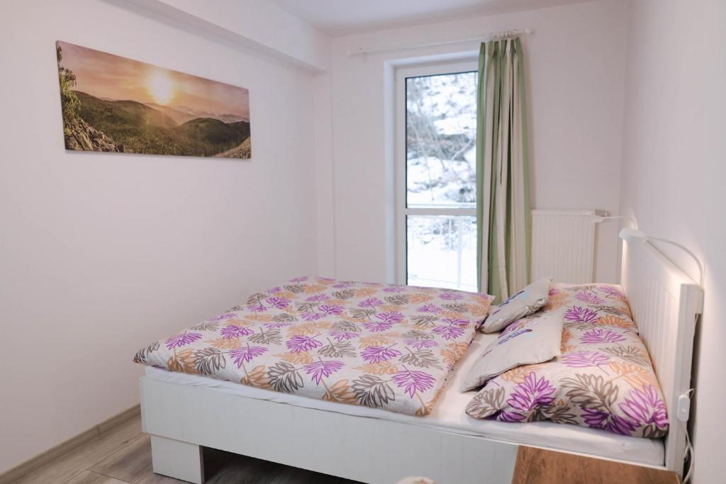 Postel nebo postele na pokoji v ubytování Flower Apartment