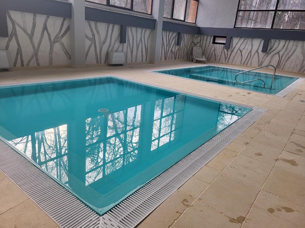 Bazén v ubytování Hotel Padis nebo v jeho okolí