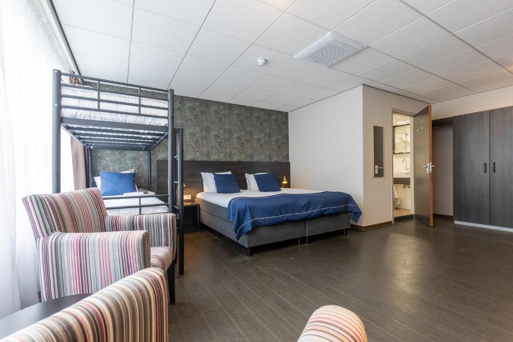 Katil atau katil-katil dalam bilik di City Hotel de Jonge