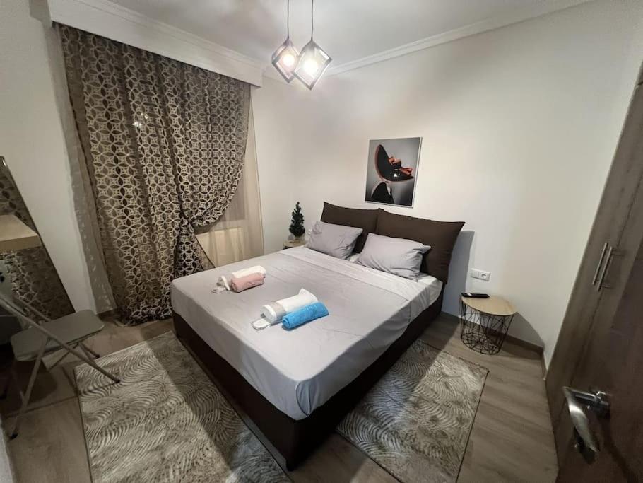 Postel nebo postele na pokoji v ubytování Όμορφο διαμέρισμα στην Παραλία