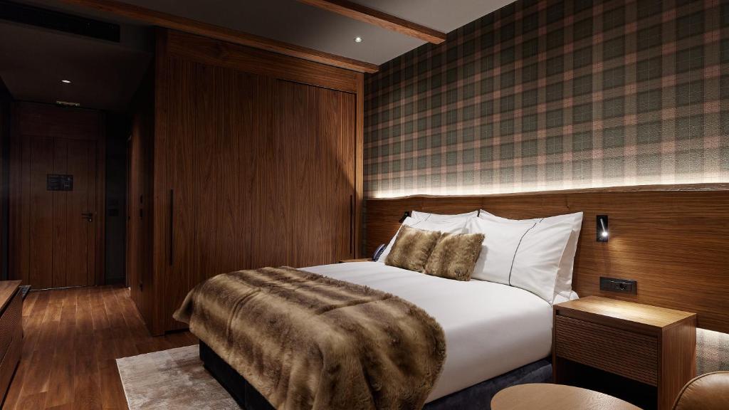 Bor Hotel by Karisma tesisinde bir odada yatak veya yataklar