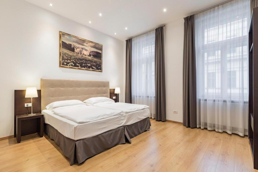 Krevet ili kreveti u jedinici u okviru objekta President Masaryk Apartment