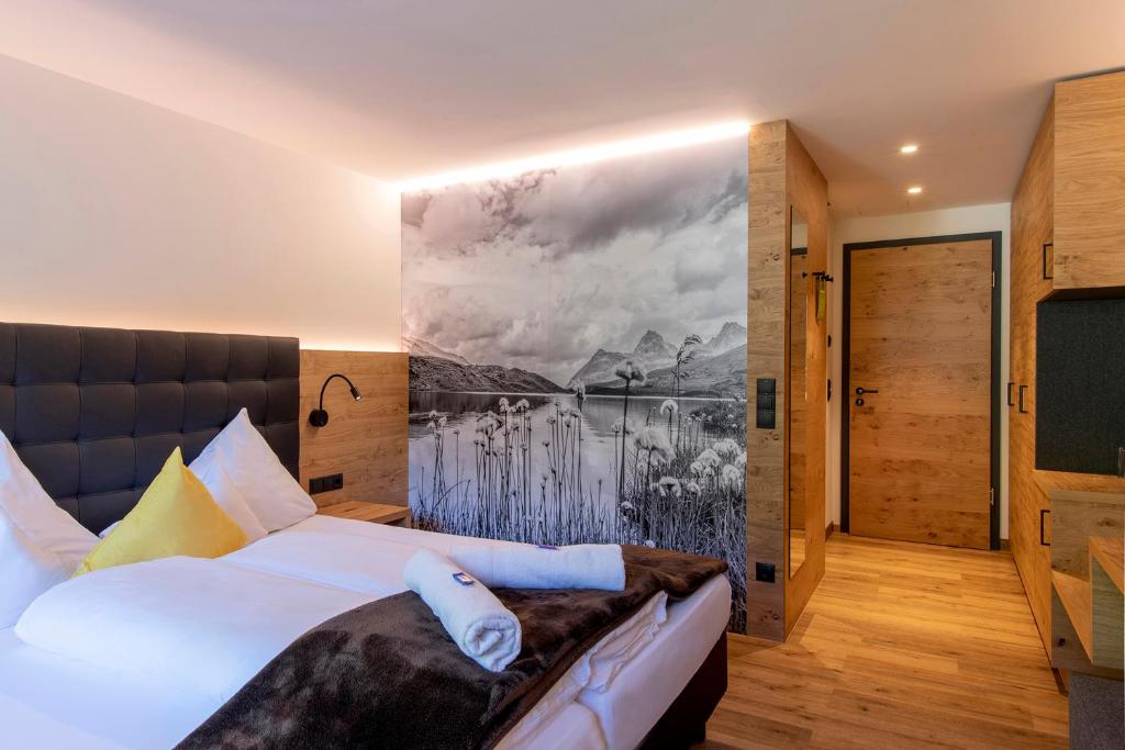 Voodi või voodid majutusasutuse Hotel Sonnblick toas