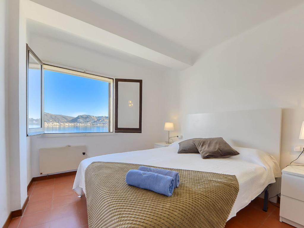 Posteľ alebo postele v izbe v ubytovaní Apartment Rhodas by Interhome