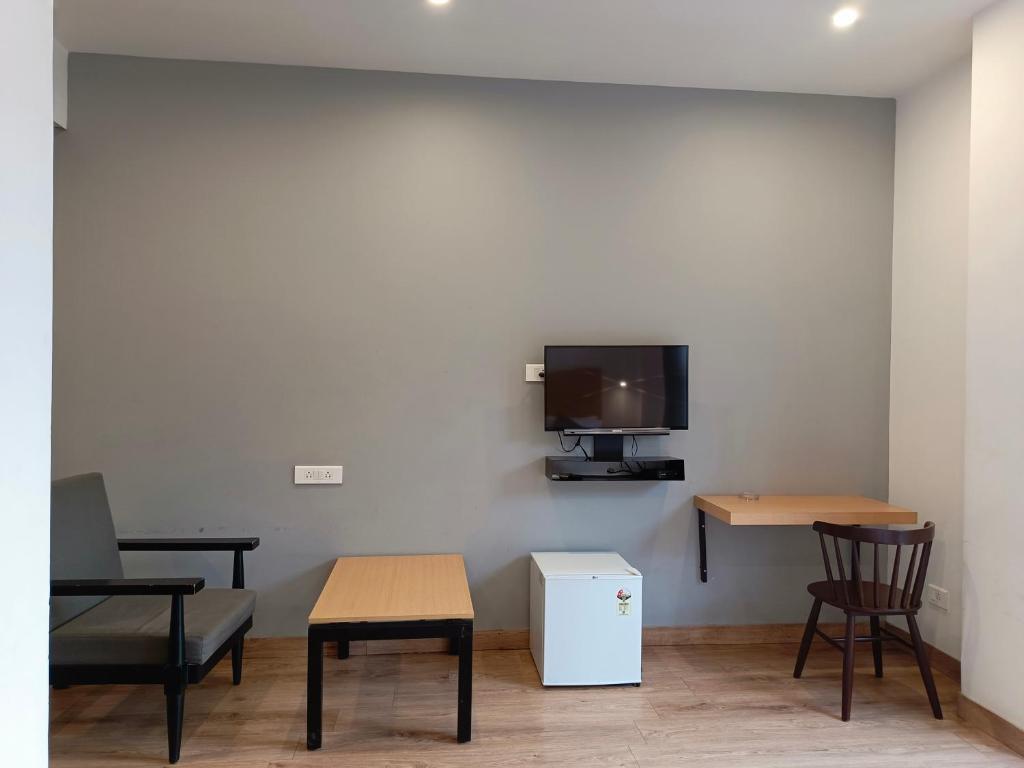 TV a/nebo společenská místnost v ubytování SM Hives Business Hotel