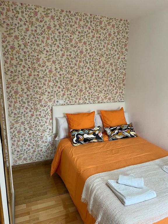 Cama o camas de una habitación en Hostal Flat55Madrid