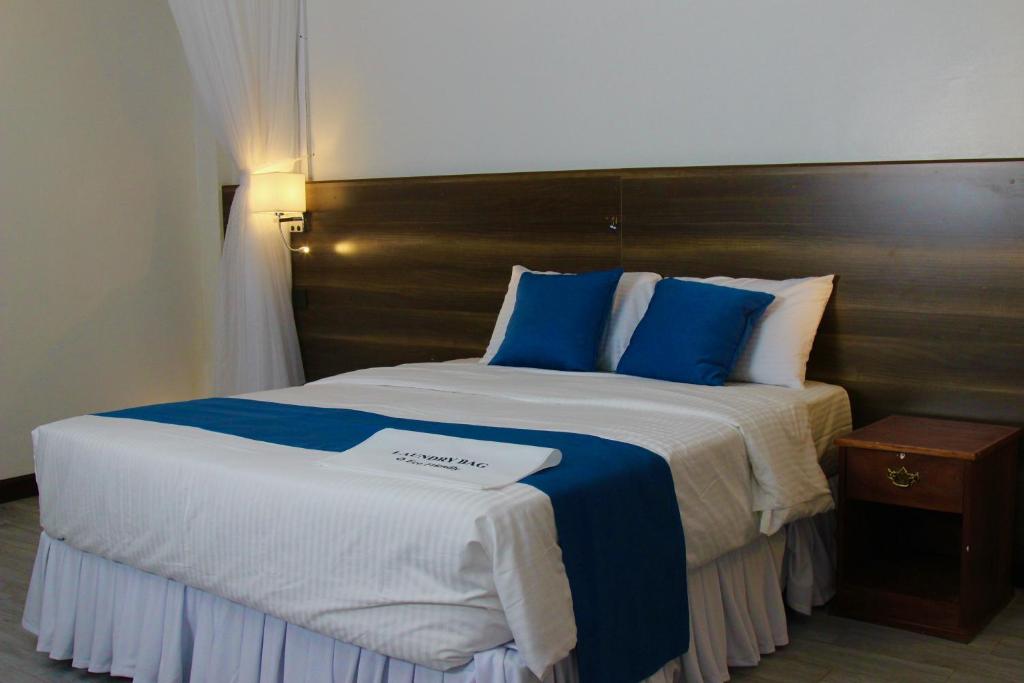 Postel nebo postele na pokoji v ubytování Lukenya Alkebu Resort