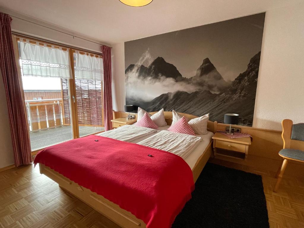 Postel nebo postele na pokoji v ubytování Hotel AlpIn Bed & Breakfast