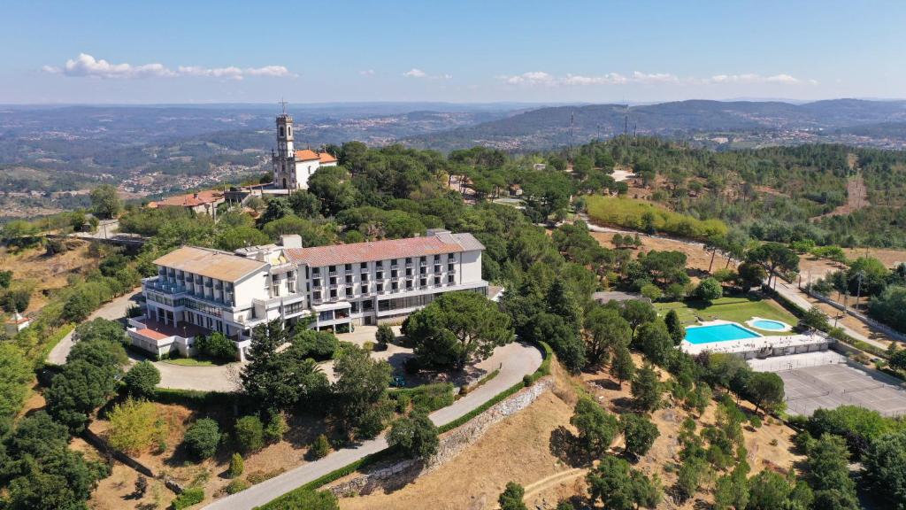 an aerial view of a building on a hill at Hotel Senhora do Castelo in Mangualde