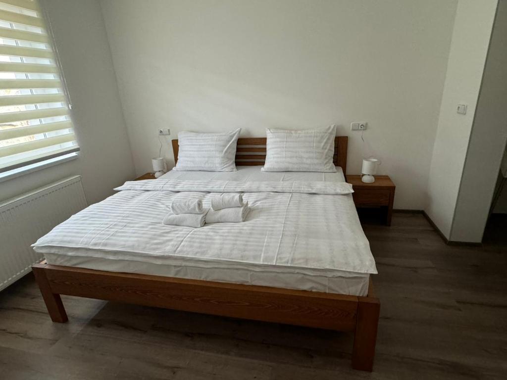 Łóżko lub łóżka w pokoju w obiekcie Wellness & Spa Apartments Lipno - Frymburk