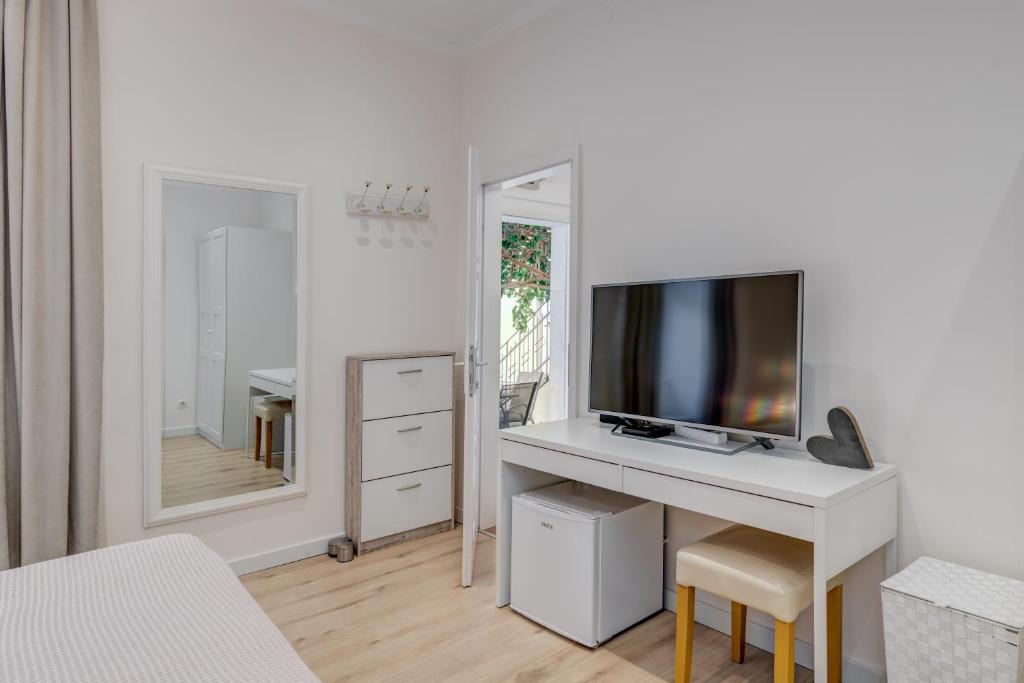 TV a/nebo společenská místnost v ubytování Victoria Luxury Rooms - Split Downtown
