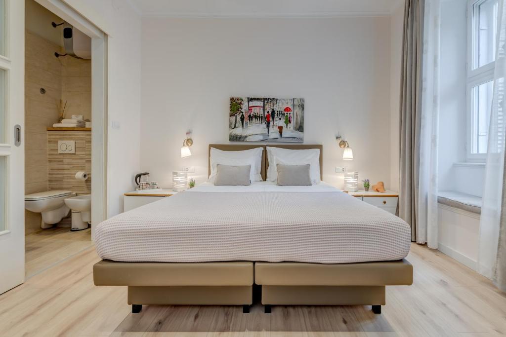 Postel nebo postele na pokoji v ubytování Victoria Luxury Rooms - Split Downtown