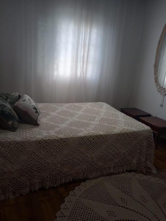 Voodi või voodid majutusasutuse Simples e confortável toas