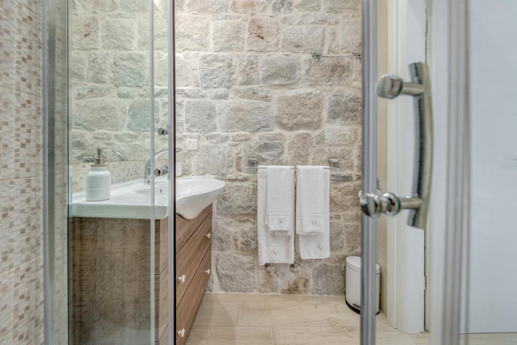 Koupelna v ubytování Victoria Luxury Rooms - Split Downtown