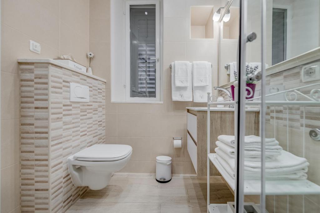 Koupelna v ubytování Victoria Luxury Rooms - Split Downtown