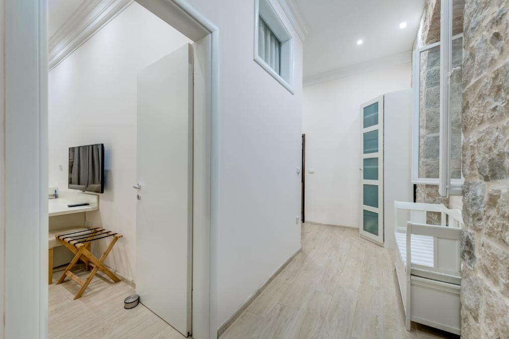 TV a/nebo společenská místnost v ubytování Victoria Luxury Rooms - Split Downtown