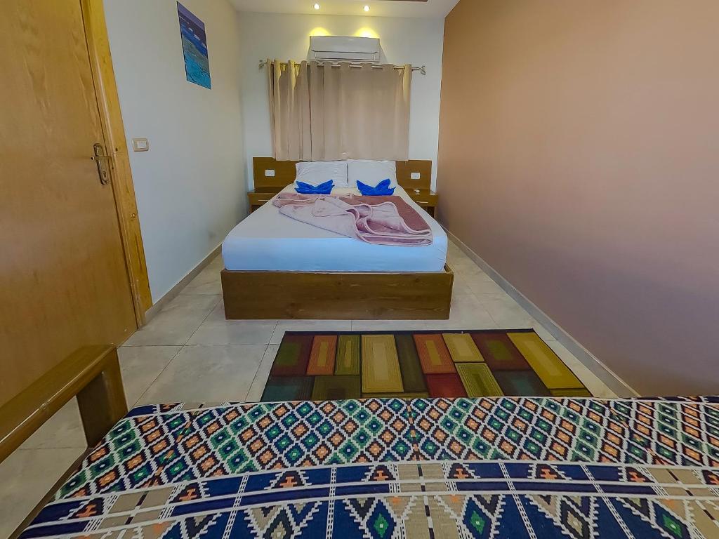 Postel nebo postele na pokoji v ubytování Seaview Hotel Dahab