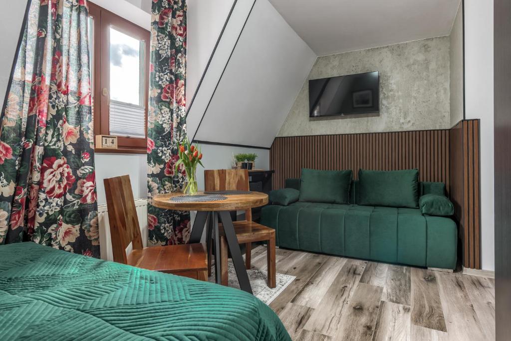 Posedenie v ubytovaní Przytulia Apartamenty i Pokoje