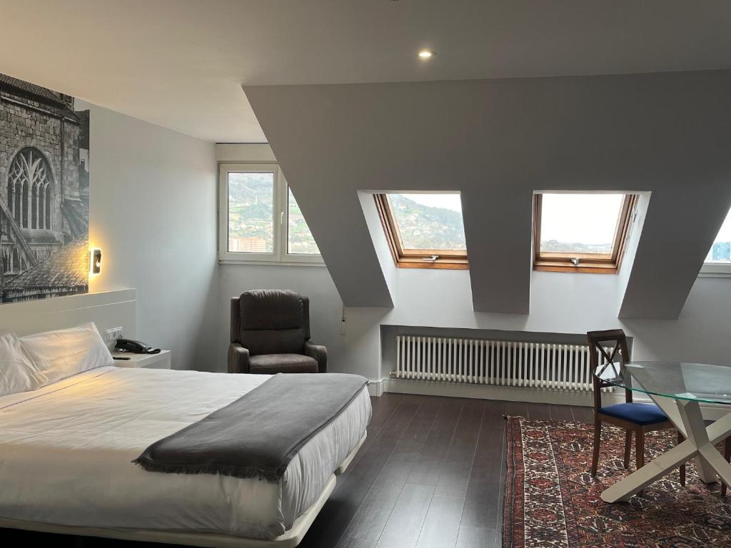 Postel nebo postele na pokoji v ubytování Hotel Gran Regente