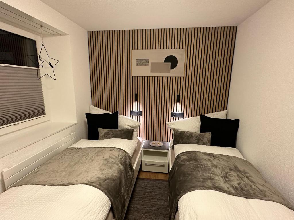 Postel nebo postele na pokoji v ubytování Apartment Enzian