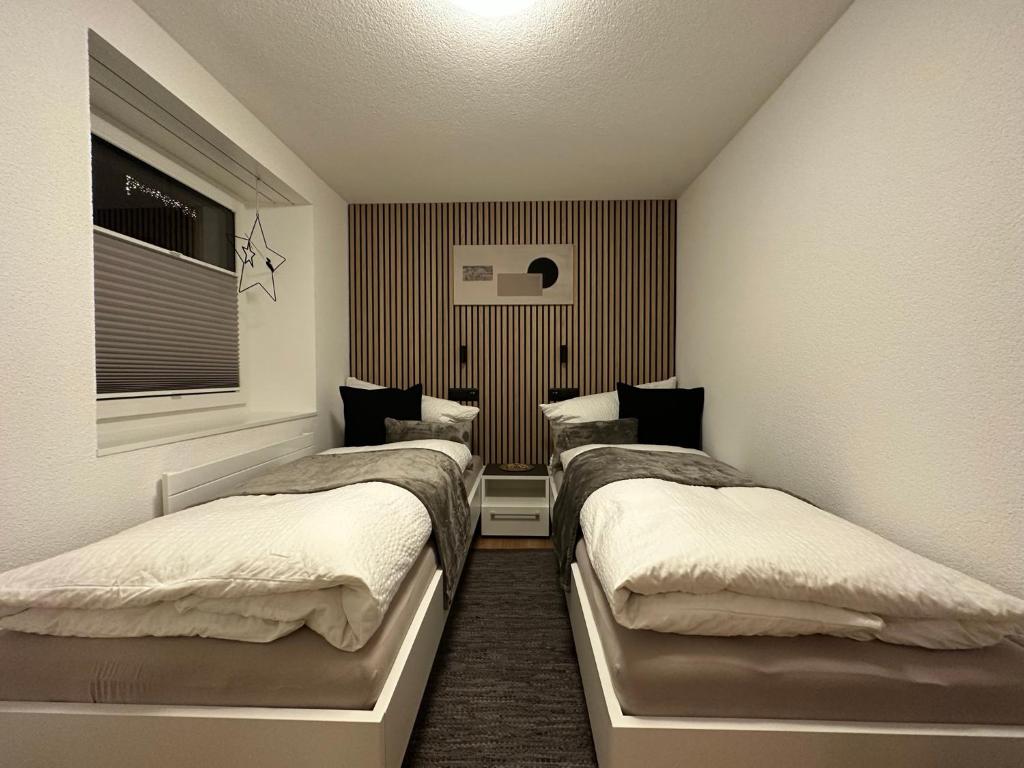 Postel nebo postele na pokoji v ubytování Apartment Enzian