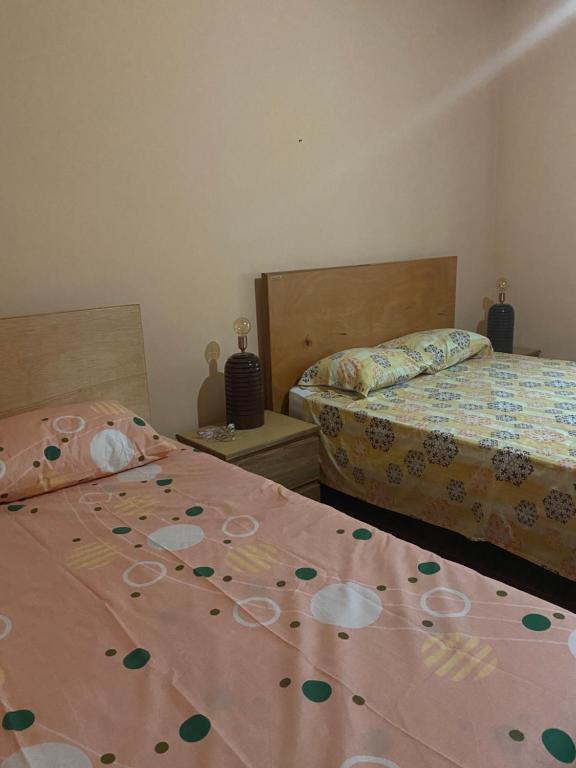 Postel nebo postele na pokoji v ubytování La Rosa Buga
