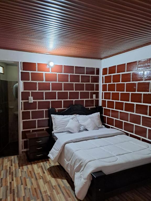 Postel nebo postele na pokoji v ubytování Cabañas Amalú
