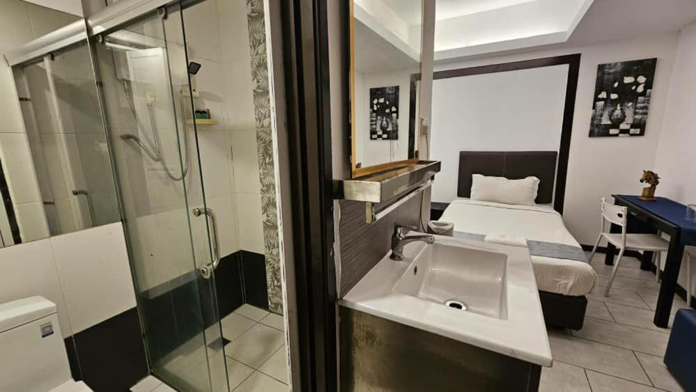 Koupelna v ubytování Warisan Hotel Kota Kinabalu