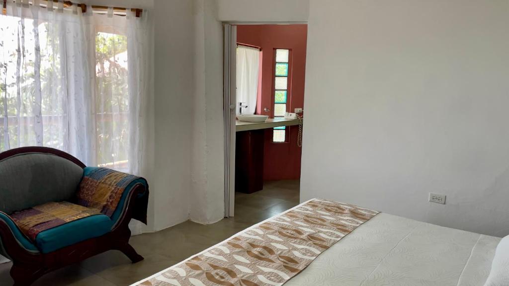 Postel nebo postele na pokoji v ubytování Samai Lodge Holistic Living