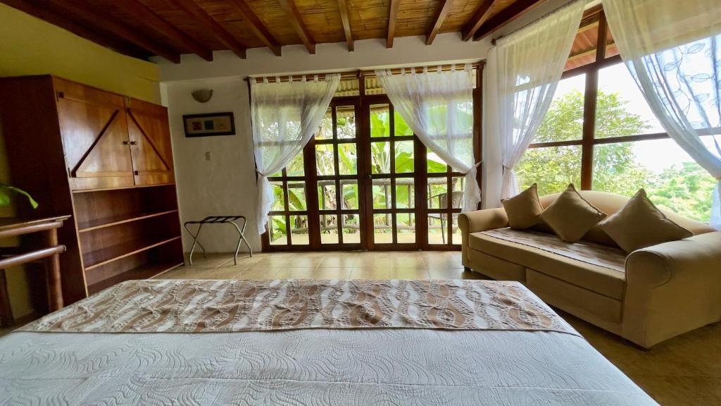 Postel nebo postele na pokoji v ubytování Samai Lodge Holistic Living