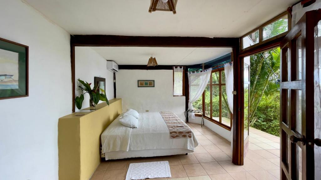 Postel nebo postele na pokoji v ubytování Samai Lodge Holistic Living