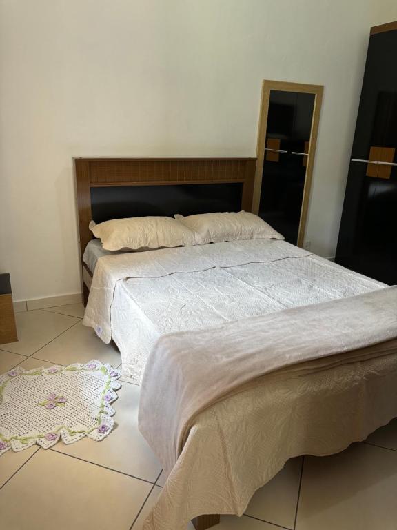 Кровать или кровати в номере Alojamento Araújo