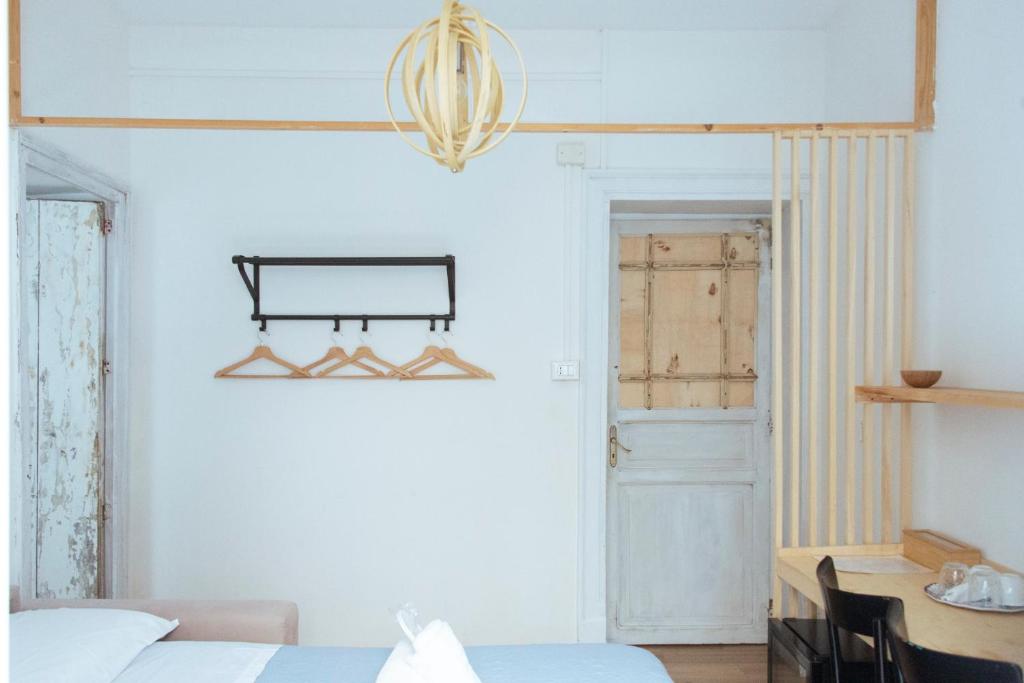 Postel nebo postele na pokoji v ubytování Artisan Maison Palermo