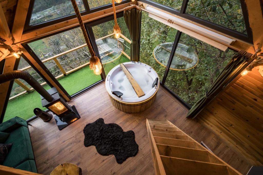 an overhead view of a tub in a tree house at Pavri suit bungalov in Ardeşen