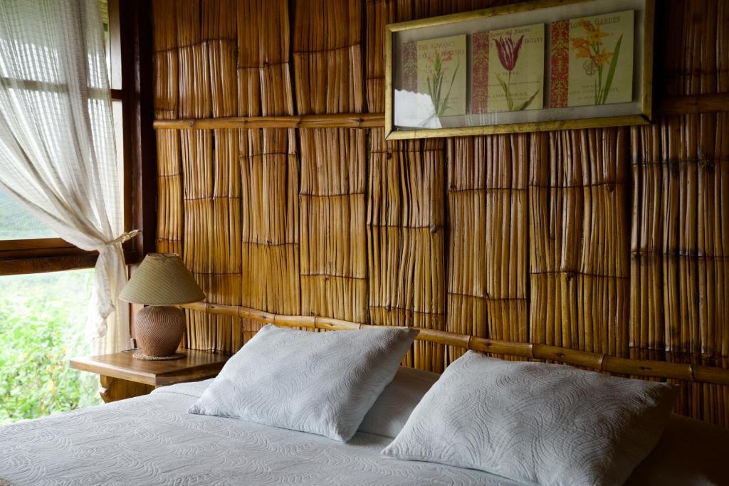 Postel nebo postele na pokoji v ubytování Samai Lodge Holistic Living