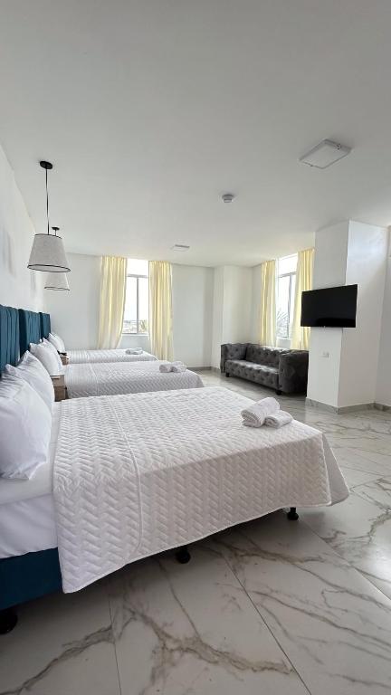 Postel nebo postele na pokoji v ubytování Hotel Presidente Beach Playas