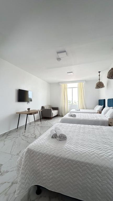 Postel nebo postele na pokoji v ubytování Hotel Presidente Beach Playas