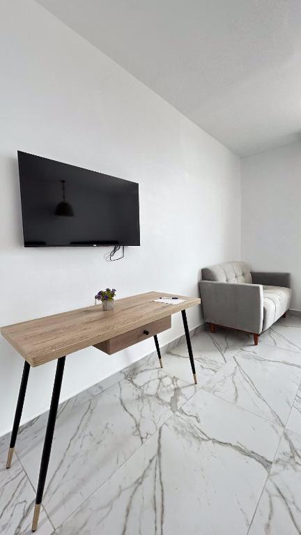 TV a/nebo společenská místnost v ubytování Hotel Presidente Beach Playas