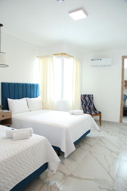 Postel nebo postele na pokoji v ubytování Hotel Presidente Beach Playas