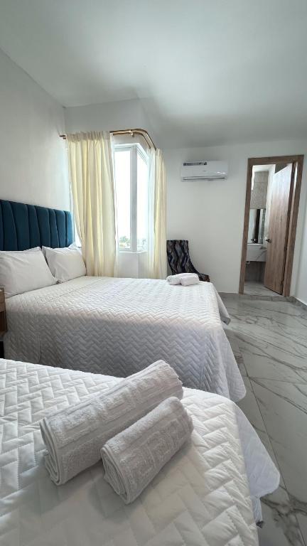 Postel nebo postele na pokoji v ubytování Hotel Presidente Beach Playas